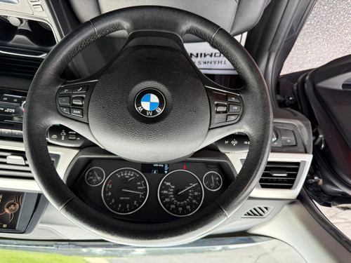 2017 BMW 320i — photo 22
