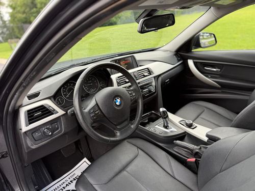 2017 BMW 320i — photo 24
