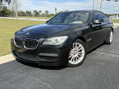 2013 BMW 740 — photo 1